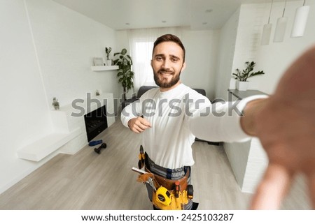 Good day mood build builder construction constructor engineer workman repairman concept. Close up photo portrait of cheerful glad handsome beaming toothy bearded guy make take selfie on smart phone.