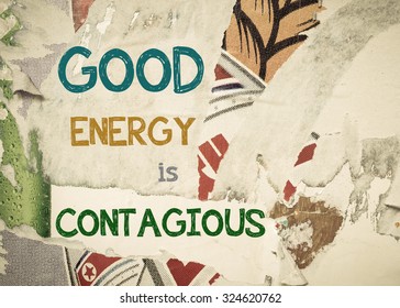 Good Energy Is Contagious - Inspirational Message Written On Vintage Grunge Background With Old Torn Posters. Motivational Concept Image