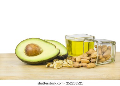 Good fats diet (avocado, dry fruits and oil) - Shutterstock ID 252233521