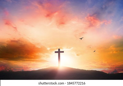 Good Friday Concept: Silhouette Cross On  Mountain Sunset Background