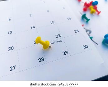 Good Friday march with push pins on calendar