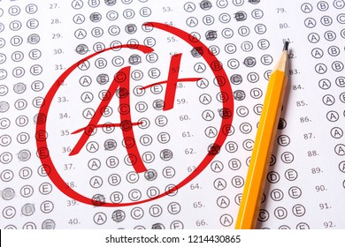 Good grade of A plus (A+) is written with  red pen on the tests.