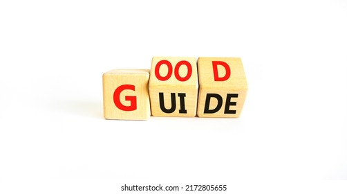 Good guide symbol. Concept words Good guide on wooden cubes. Beautiful white table white background. Good guide and business concept. Copy space.