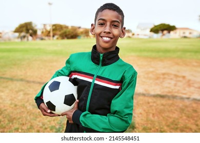 Its good to have goals. Portrait of a young boy playing soccer on a sports field. - Powered by Shutterstock