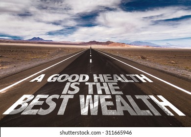 A Good Health is the Best Wealth written on desert road - Powered by Shutterstock