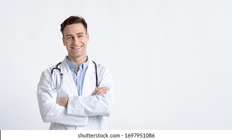 Good Health Concept. Smiling Doctor With Crossed Arms, Panorama