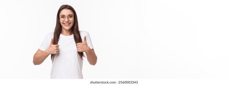 Good idea, lets do it. Enthusiastic smiling caucasian woman in glasses, fully support your plan, show thumbs-up and nod in approval, grinning positive reply, like and encourage keep going.