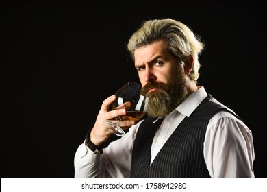 Good Indication Of Condition Of Whisky. Bearded Businessman In Elegant Suit With Glass Of Whisky. Sommelier Tastes Expensive Drink. Elegant Macho Drink Cognac. Matured In Sherry Casks. Whisky Tasting.