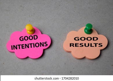 Good Intentions or Good Results write on sticky note isolated on Office Desk. Selective focus on text - Shutterstock ID 1704282010