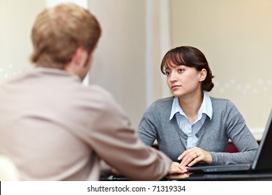 Good Looking Boss Talking To Her Employee