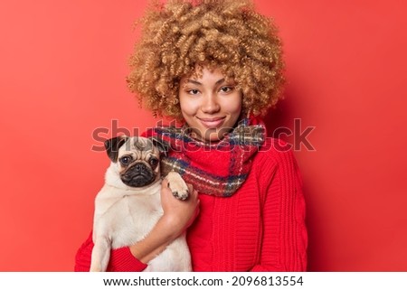 Similar – Image, Stock Photo beautiful caucasian woman holding a brown leather dog leash at sunset in countryside. Pets and lifestyle outdoors. close up view