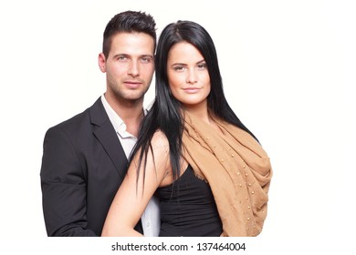 Good Looking Couple Standing In Elegant Cloth