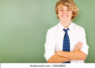 Good Looking Male High School Student In Classroom