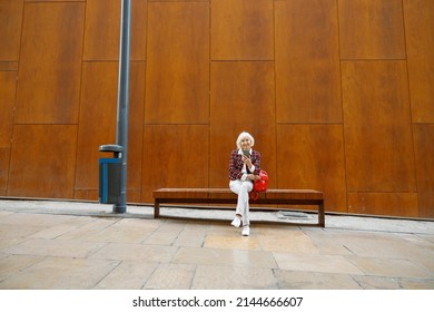 Good Looking Senior Lady Resting At City Center