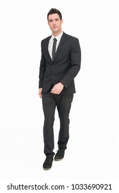 Good Looking Young Business Man In Black Suit Full Body Isolate On White Background With Walking Action