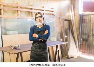 Good Looking Young Confident Woman Working As Carpenter In Her Own Woodshop
