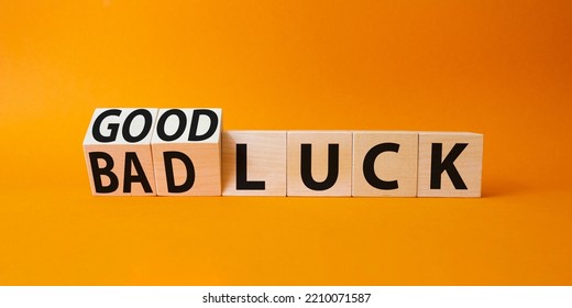 Good Luck And Bad Luck Symbol. Turned Wooden Cubes With Words Bad Luck And Good Luck. Beautiful Orange Background. Business Concept. Copy Space