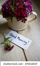 Good Morning Note And Flowers In A Vase