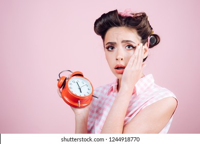 good morning. time management. pinup girl with fashion hair. retro woman with alarm clock. Time. pin up woman with trendy makeup. sleepy tired girl in vintage style. No time for break.