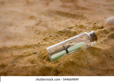 Good News in  a Bottle concept, Message in a Bottle on the san - Shutterstock ID 544669849