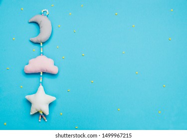 Good Night Baby Concept. Baby Toys Moon, Cloud And Star On Blue Background With Blank Space For Text. Top View, Flat Lay.