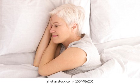 Good Sleep. Healthy Senior Woman Napping In Bed, Top View, Panorama