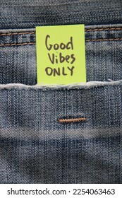 Good vibes only concept Motivational quotes inscription on a tag in a pocket of blue jeans. - Shutterstock ID 2254063463