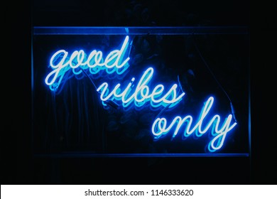 Good vibes only words in neon light signage.