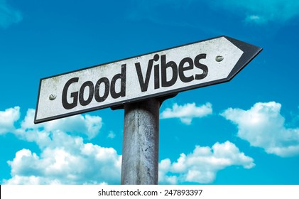 Good Vibes sign with sky background