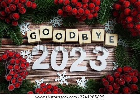 Goodbye 2023 holidays celebration with christmas decorations background