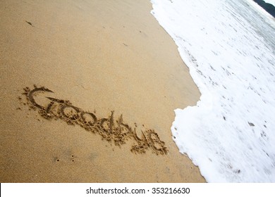 Goodbye Note Written On Beach With Wave