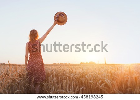 goodbye or parting background, farewell, woman waving hand in the field