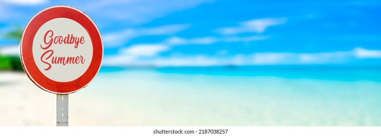 Goodbye Summer In Road Sign Against A Blurry Beach Landscape, Blue Sky Background