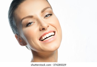 Good-looking Girl With A Big Smile And A Smooth, White, Healthy Teeth