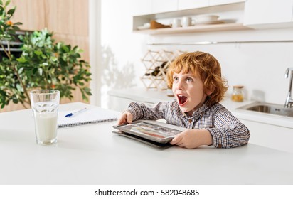 Goofy Adorable Kid Looking Surprised