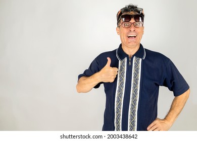 Goofy Guy With Two Pair Of Glasses On Face With A Thumb Up Expression Celebrating Vacation Time. 