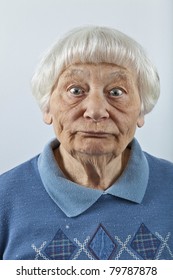 Goofy Senior Woman Head And Shoulders Portrait