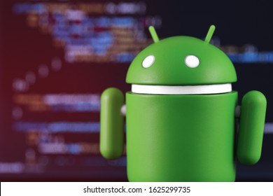 Google Android figure on digital background closeup. Google Android is the operating system for smartphones, tablet computers, e-books, and other devices. Moscow, Russia - March 18, 2019