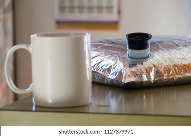 Goon sack lying on a kitchen bench slightly hanging off the edge