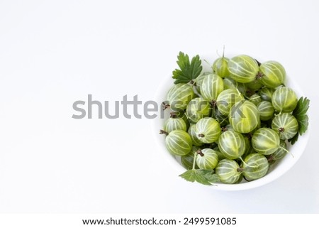 Similar – Image, Stock Photo Top view of organic gooseberries in a vintage bowl