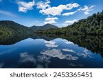 Gordon River Reflections Cruise Strahan Tasmania clouds reflected in river still calm serenity landscape peacful cruising the gordon river wilderness cool climate rain forest