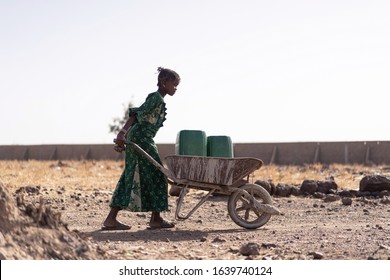 Gorgeous African Girl Working with fresh Water in Bamako