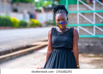 A Gorgeous African Hipster Woman Wearing A Homemade Mask For Protection On Street