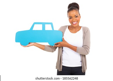 gorgeous african woman holding a car symbol on white background - Powered by Shutterstock