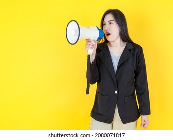 Gorgeous Asian businesswoman calling staff to announce news and alert rule info by loudspeaker and speak out order message to command direction and guide crew to force public sale advertisement