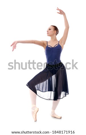 Gorgeous ballerina in action white background