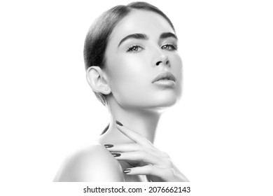 Gorgeous Beautiful Young Fashion Model Woman Close Up Beauty Face Portrait, Perfect Skin. Young Female Model Isolated. Skincare Facial Treatment Concept. Monochrome