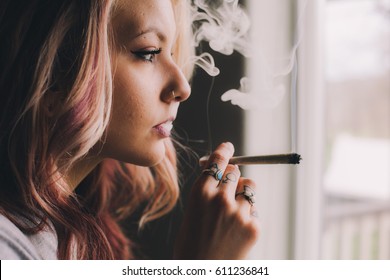 Gorgeous Blonde Woman Smoking Cannabis Joint