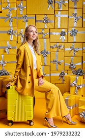 Gorgeous Caucasian Woman Is Preparing To Go On Journey, Trip, Posing With Yellow Suitcase, New Life And New Opportunities Cocnept