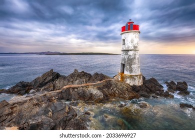Gorgeous gloomy view of Capo Ferro Lighthouse. Popular travel destination of Mediterranean sea. Location: Porto Cervo, Province of Sassari, Sardinia, Italy, Europe